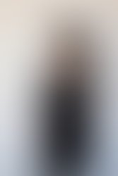 Victoria wrap dress as duster holding mic