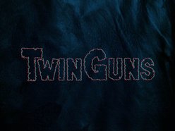 TWIN GUNS