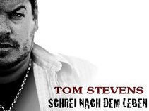 TOM STEVENS