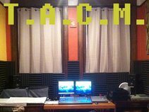 T.A.C.M.