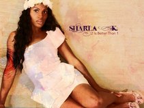 SHARLA K.