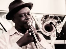 Neville 'MacDaddy' Anderson / Brass Rootz International