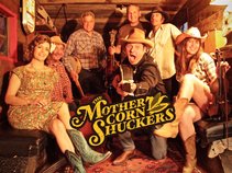 The Mother Corn Shuckers