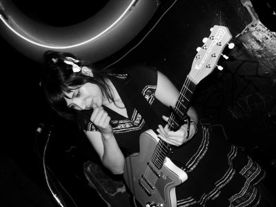 Heather with her trusty Dan Electric Guitar