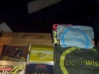 Clockwise's merchandise for sale on the merchandise stall. Photo Credit: Alan Kenny.