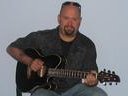James D. Harvey - band leader, singer songwriter, guitarist and bassist