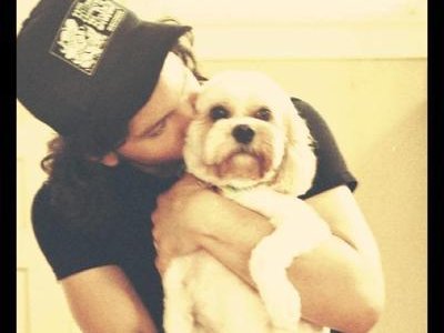 Brock, the lead singer of the Boomswagglers, with his dog.