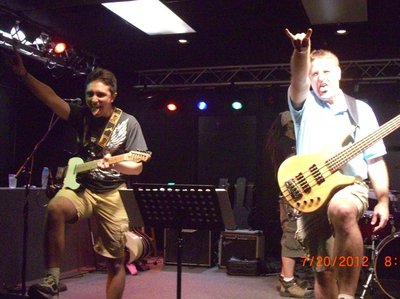 Mike showing Trevor how to do the proper Rock and Roll pose.
