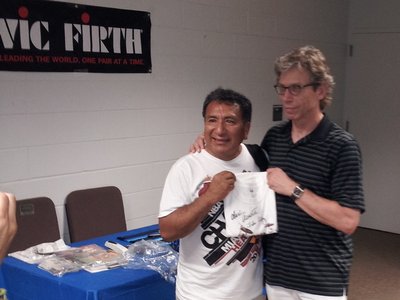 Alex Acuna  & John Riley  Holding 2012  signed CDP Camp t-Shirt