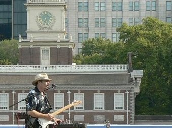 Performing at the Philadelphia Visitors Center. Independence Hall in The background.