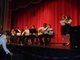 performing at school.