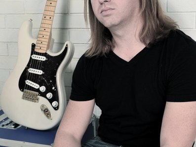 Justin Lead guitar & backup vocals