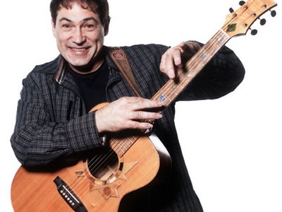 Don Alder playing 6 string nation guitar