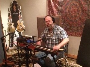Slash Helps Steve tune his hammerer dulcimer....again.