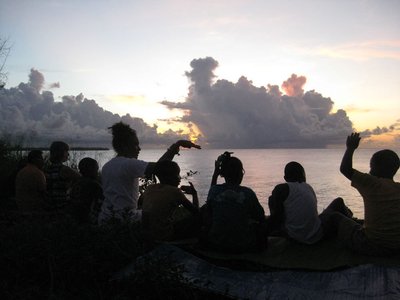 Yoga with the children on the cliff at sunset (Buccoo, Tobago)