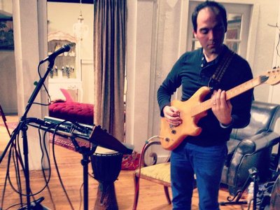 Bryan playing electric guitar @ The Photo Center - 10/26/12