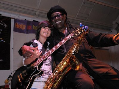 Sharing the stage with the"BIG MAN" Clarence Clemons from Bruce Springsteen's E Street Band.