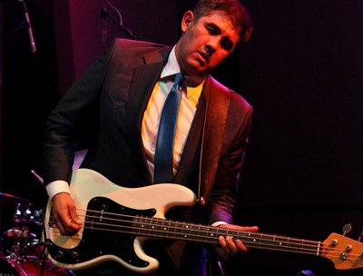 Mike Barrientos, bass.