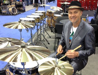Manny checking out master drum builder Johnny Graviotto's drums