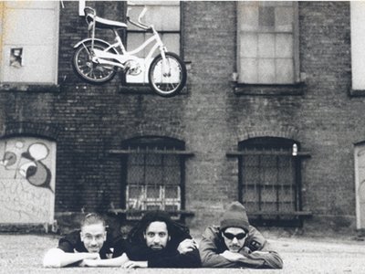 Red Eye 9 photo shoot Ghost jumping a kiddie bike over us, Evil Kenievel style. Boston MA