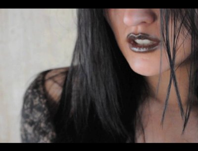 Still shot from the "Buda Negra" music video