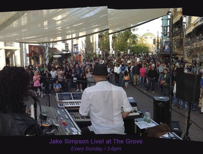 Jake Simpson and his band onstage at The Grove