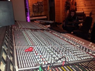 Keeping a watchful eye on the mixing board.