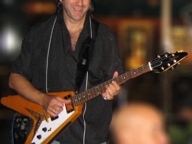 Jr playing the Epi Flying V