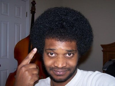 Everyone likes the fro! Heh. Typical Bassist.