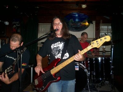 Ill'in: guitar, Al: drums, J.T.: bass/lead vocal - "Crowmagnumb" at The Snubbing Post, Rome NY