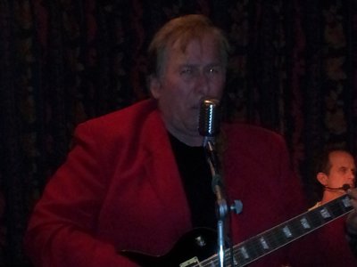 The Red Sport Coat and the Golden Guitar