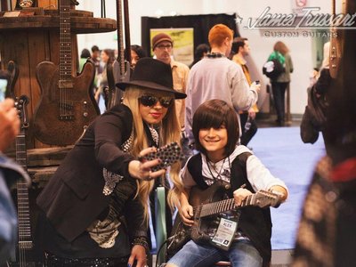Orianthi (Micheal Jackson lead guitarist) heard me jammin' at the James Trussart booth & came over t