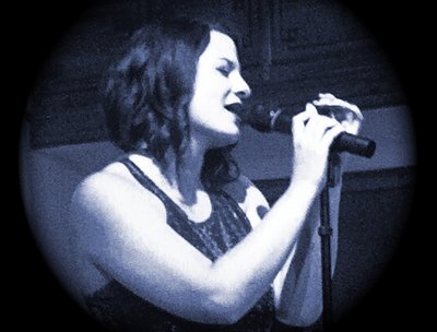 Belting out 'Feeling Good', big-band style