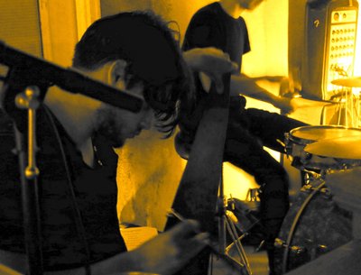 Alex on saw for a semi-acoustic performance