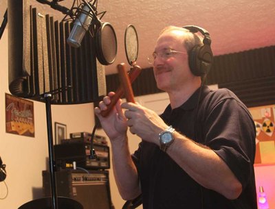 Warren recording some additional percussion with a set of "claves"
