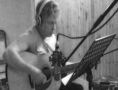 Pierre Teodori on acoustic guitar
