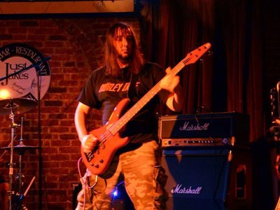 Elo, our bass player, kicks a$%