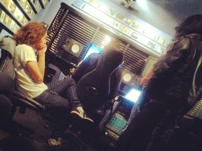 in the studio, mixing the album