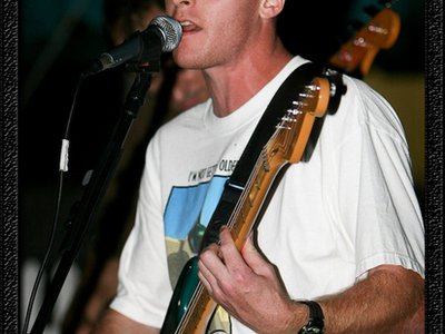 Steve playing electric guitar