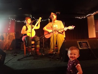 Moth and Rachel playing at The Mill in Iowa City. Even baby Inga loves the music!