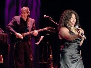 Michael Lewis with Mary Wilson of the Supremes