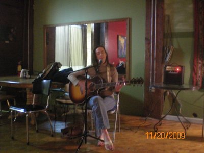 Kim playing guitar at Writer's Bloc 11/09