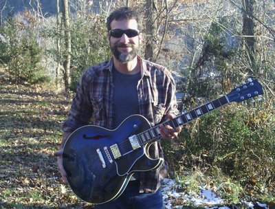 With "Blue", a Gibson ES-137