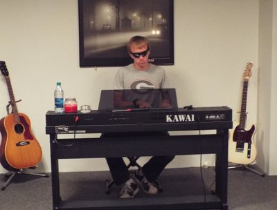 Playing piano in the studio - July 2013