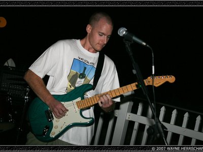 playing electric guitar