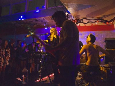Playing to a packed house at Love the Captive