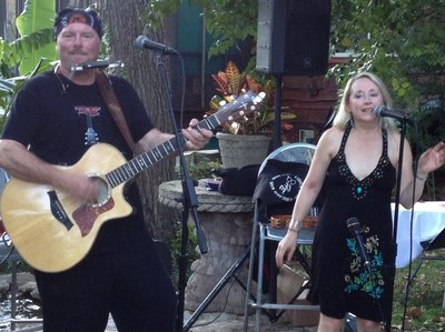 Performing in Austin, TX at a house concert.