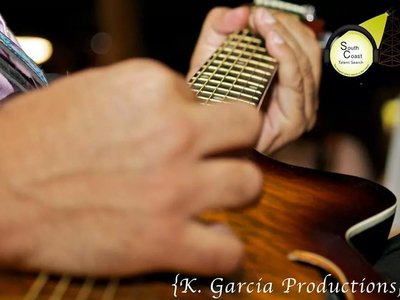 Ric's slow hands on his "Adonis" brand -  the red squirrel guitar
