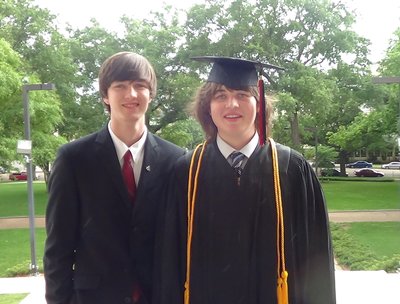 Carson Finally graduated high school in May 2014. Carson with his brother Leighton.