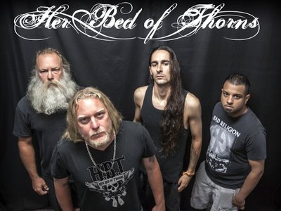 HER BED OF THORNS photo